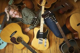 Singer songwriter Catie Curtis with guitars