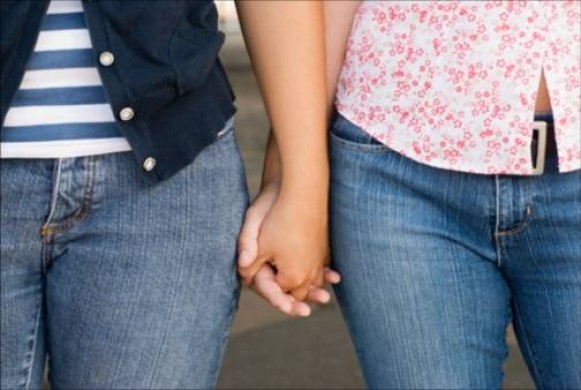 Girls holding hands