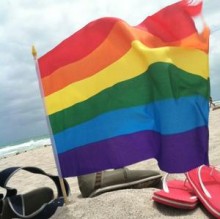 Gay pride flag and flip flops