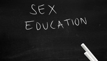 Sex education written on blackboard