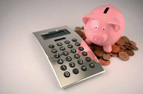 Piggy bank, calculator, coins