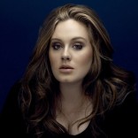 Adele says ex-boyfriend left her for a man