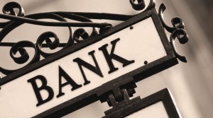 Wrought iron sign that says "Bank"