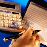 Woman Balancing Her Checkbook
