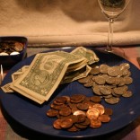 Dinner plate with money on it