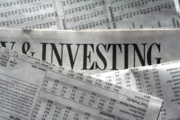 Investing headline in newspaper
