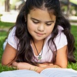 Latina child with book