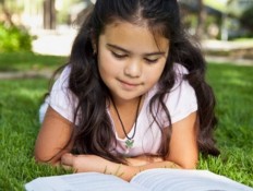 Latina child with book