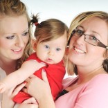 Two women with a baby