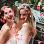 Lesbian wedding with rose petals