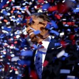 President Barack Obama amidst confetti after giving his victory speech