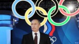 Putin and Olympic rings