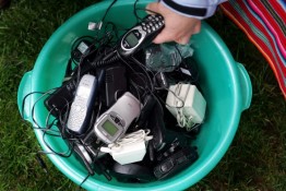 Trash can full of cell phones
