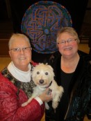 The Rev. Joanne Carlson Brown (left), and the Rev. Christie Lagergren Brown with their dog Thistle