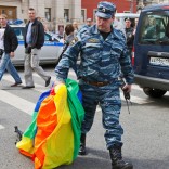 Russian solider with rainbow flag