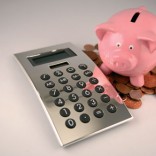 Piggy bank, calculator, coins