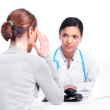 Female doctor with female paitient