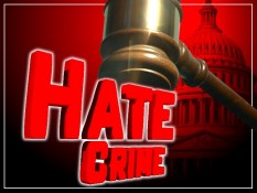 Hate crime text with gavel and US Capitol