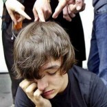 Ohio school settles anti-gay attack case