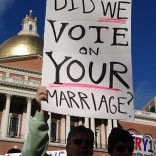 Protestors holding "Did we vote on your marriage?" sign