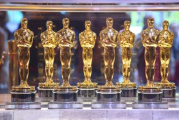 A collection of Oscar statuettes for the Academy Awards.